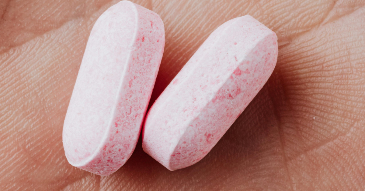 Zoloft pills for anxiety treatment. Close-up of medication on hand, used in managing anxiety symptoms. Sertraline tablets.