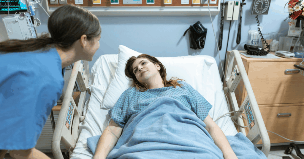 image | Clear Mind Treatment | Comprehensive Mental Healthcare Woman receiving ketamine therapy at home, nurse present. Mental wellness treatment in a comfortable environment.