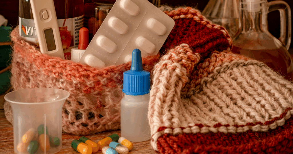 Ketamine nasal spray with pills, thermometer, and medicine bottle. Nasal spray for treatment-resistant depression.